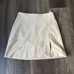 Aritzia Cream Mini Skirt with Subtle Side Slit